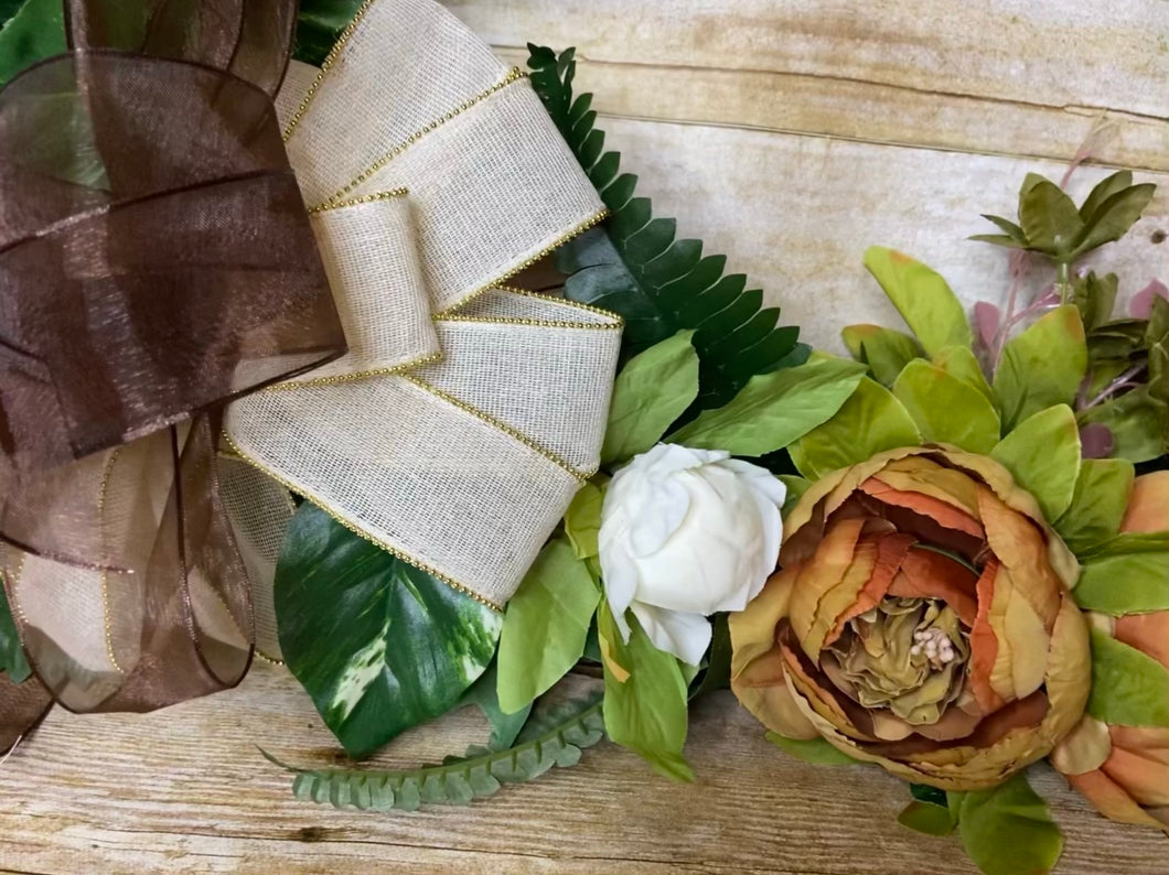 Grapevine Wreath With Brown And Cream Flowers.jpg